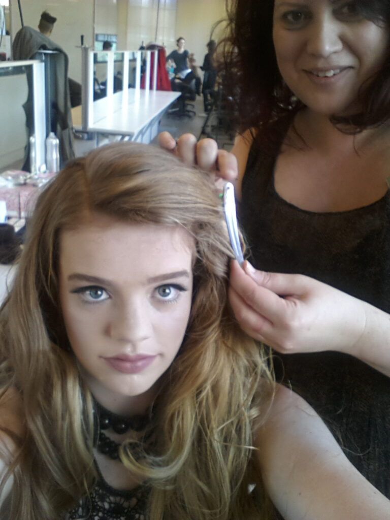 woman getting her hair done at salaon